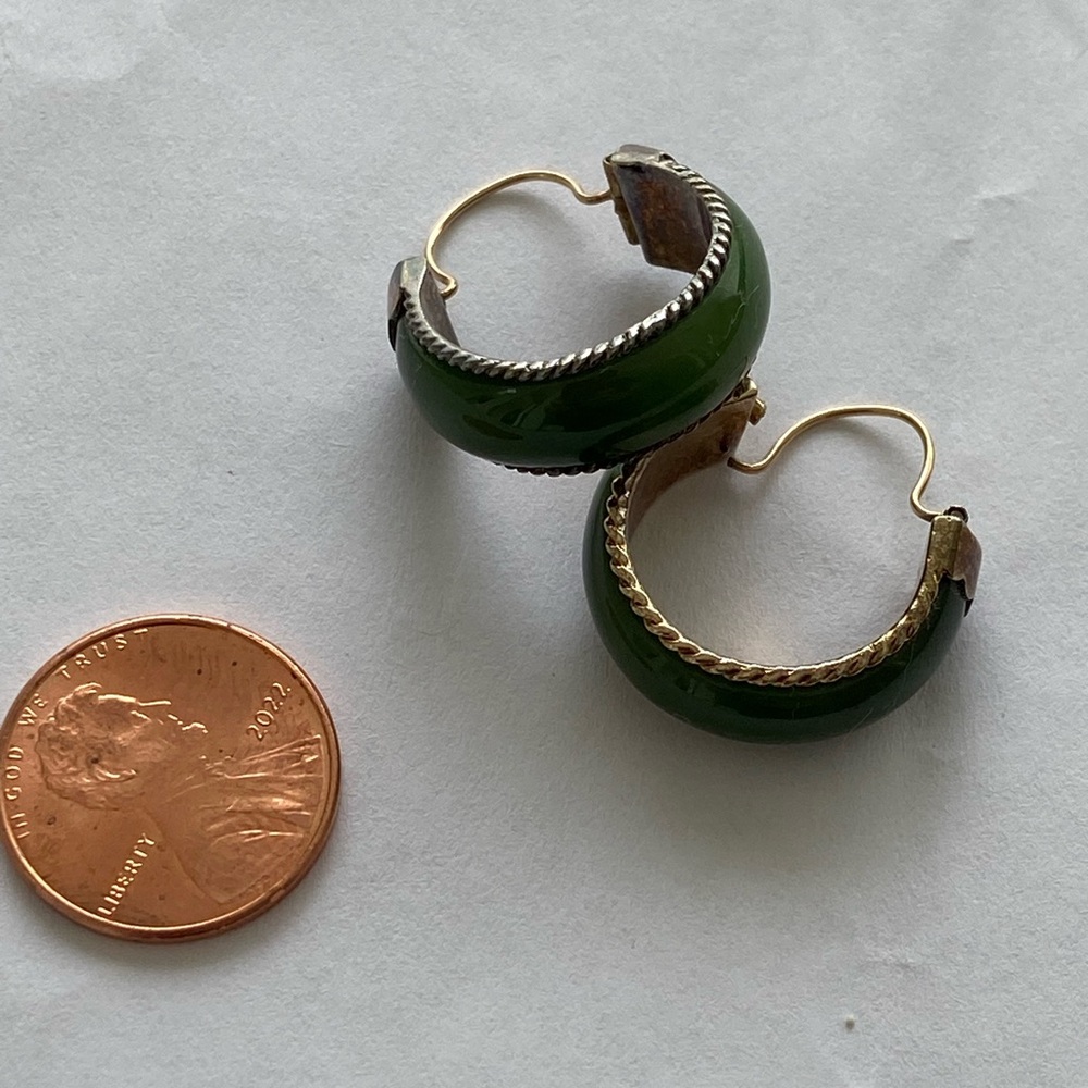 Silver earrings with natural green stone.